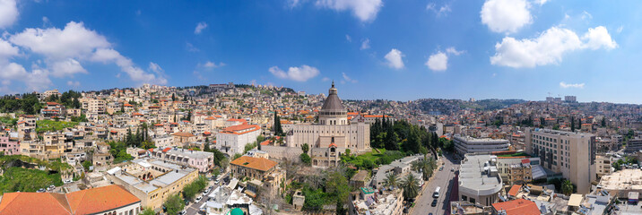 Aerial panoramic image of the Basilica of the Annunciation over the old city houses of Nazareth - obrazy, fototapety, plakaty