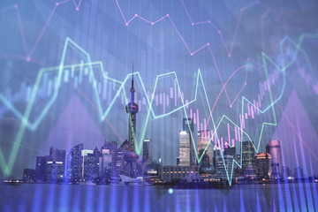 Forex chart on cityscape with tall buildings background multi exposure. Financial research concept.