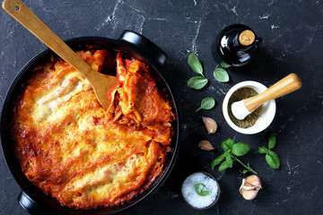 Italian cannelloni with bolognese sauce, top view