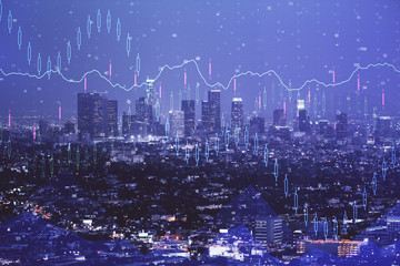 Fototapeta na wymiar Financial graph on night city scape with tall buildings background double exposure. Analysis concept.