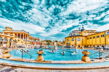 BUDAPEST, HUNGARY- MAY 05,2016: Courtyard of Szechenyi Baths, Hungarian thermal bath complex and spa treatments. - obrazy, fototapety, plakaty
