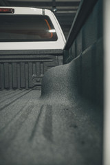 Truck bed liner polyurea coating
