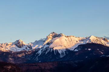 Triglav mountain range covered in morning light