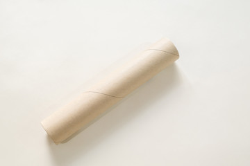 paper tubes on white backdrop, Brown paper roll