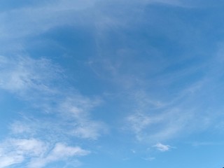 Blue sky background with white clouds