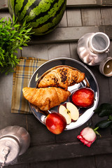 breakfast with apple and croissant
