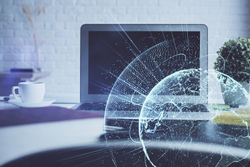Computer on desktop with social network hologram. Multi exposure. Concept of international people...