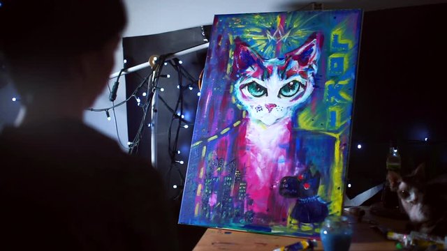 Time lapse of drawing a picture of a cat at home in self-isolation. Create a flat image on the surface with paints.