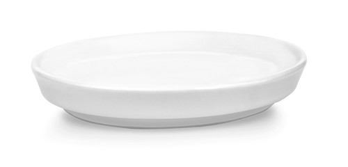 Empty white plate isolated on a white background