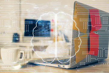 Double exposure of work space with computer and human brain drawing hologram. Brainstorm concept.