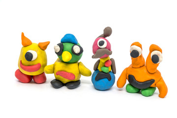 Play dough group monsters on white background. Handmade clay plasticine