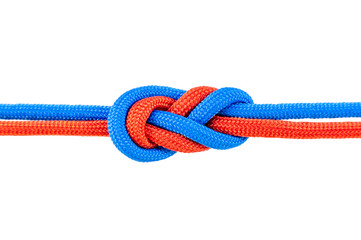 Knot on a cord isolated on a white background .