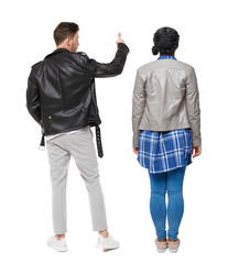 Back view of couple in sweater showing thumbs up.