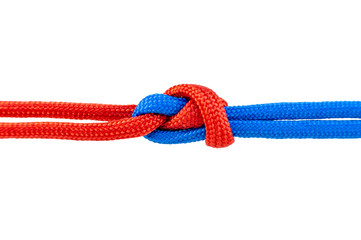 Knot on a cord isolated on a white background .
