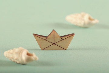 the ship is small wooden on a bright background