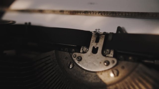 Typing "story" on retro typewriter