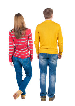 Back view couple in sweater.