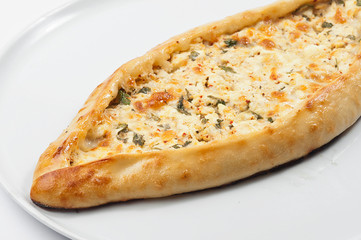 Turkish pide pizza on a white background. Turkish traditional cuisine