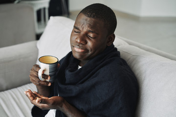 man drinking coffee