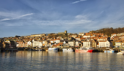 Fototapeta na wymiar Small English town Scarborough in Yorkshire on summer beautiful sunny day.