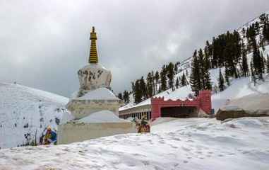 Winter landscape of the Buddhist stupa near avalanche gallery on the federal highway Yenisei in the...