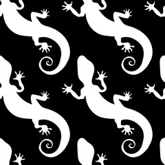 Seamless pattern vector decorative lizard. White lizards on a black background.