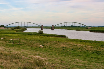 Fototapeta na wymiar Doppelbogen Bridge at the River Eider