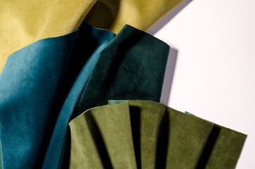 Bright collection of colorful velour textile samples. Fabric texture background