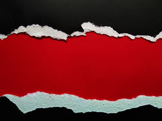 ripped paper on red background