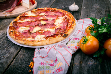 Styled Top View of Large Bacon and Cheese Pizza, Food Photography on wooden background table