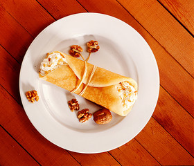 blinches Blanche's dough wraps over sweet cheese filling thin pancakes with cottage cheese and raisins filling

