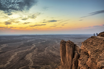 Edge of the World, a natural landmark and popular tourist destination near Riyadh -Saudi Arabia. Selective focus and background blurred