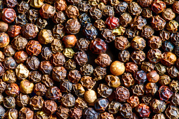 Black pepper close-up top view background
