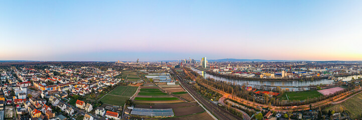 Fototapeta na wymiar Aerial picture of Frankfurt skyline and European Central Bank building during sunrise in morning twilight