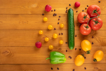Vegetables on wooden background, top view, healthy food concept, free space for text