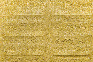 Fototapeta na wymiar Detailed texture of glittering golden dust surface. Golden Shiny Wallpaper , Perfect for Christmas, New Year or any other Holidays Background. Golden fine powder