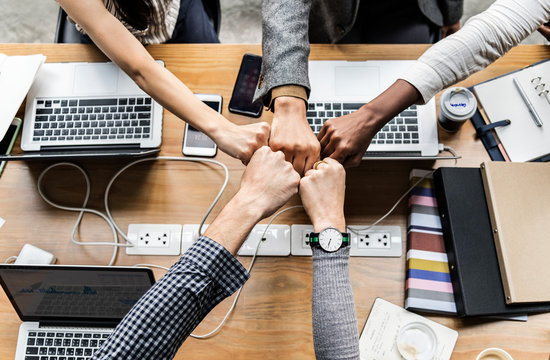 Colleagues giving a fist bump