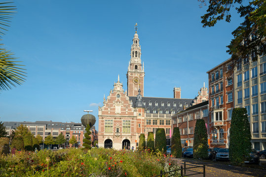 Side view (form Herbert Hooverplein) of Central Library of Catholic Library  Monseigneur on Ladeuzeplein square. Neo Flemish Renaissance style building in Leuven, Belgium