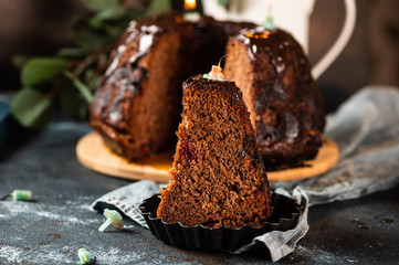 Chocolate cake with berries. bundt cake. Vegan cake. Birthday cake. Cake with candles. Piece of cake. Melted chocolate. Chocolate dessert. Birthday concept