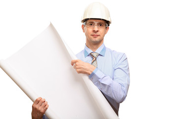 a successful engineer wearing a construction helmet, glasses, shirt, tie, shows the drawings, smiles with his mouth closed. isolated