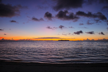 sunset seascape epic clouds with ship in saipan