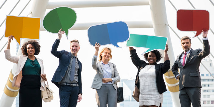Successful business people with speech bubbles