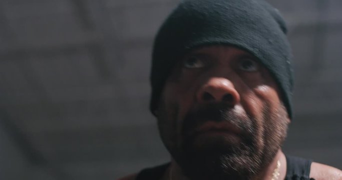 Low angle close up of fighter's face while training.