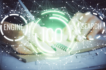 Cryptocurrency hologram over hands taking notes background. Concept of blockchain. Multi exposure