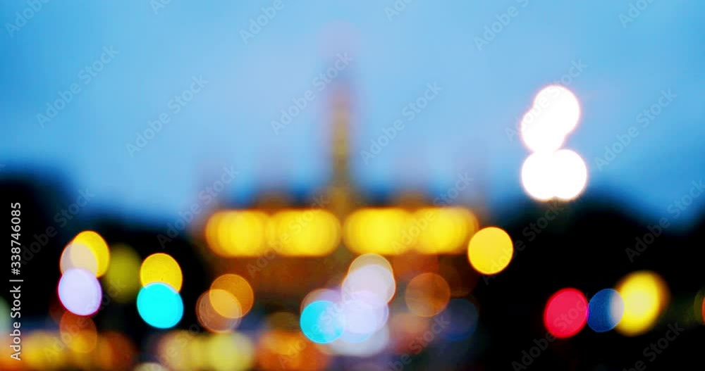 Poster Vienna, Austria. Blurred Town Hall in Vienna, Austria with evening lights. Bokeh lights with blurred landmark