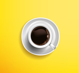 Classic white cup of coffee americano on a yellow background. View from above
