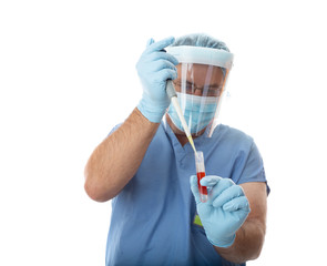 Healthcare worker pipetting a patient sample
