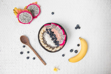 Vegan smoothie bowl with fruits and seeds