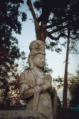 Fototapeta na wymiar buddha statue in the park