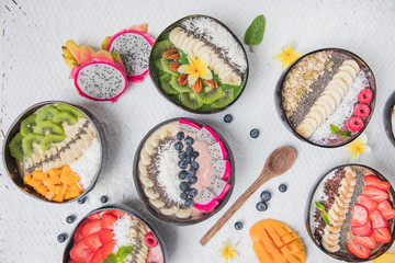 Vegan smoothie bowls with fruits and seeds